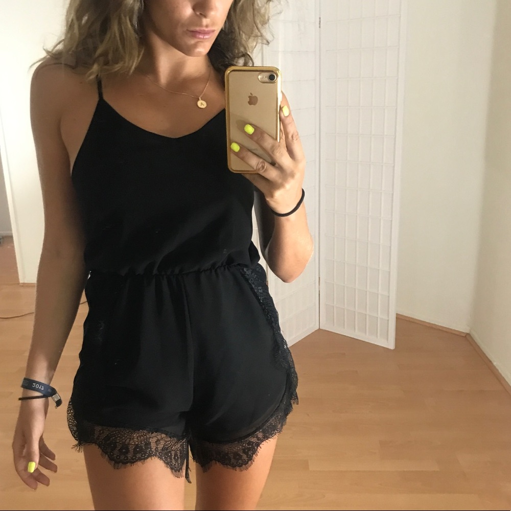 Cute black Spagetti strap romper.