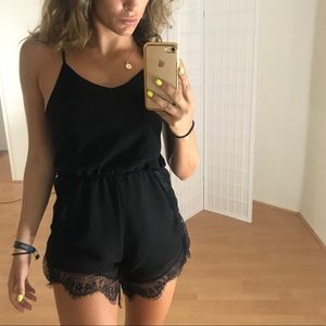 Cute black Spagetti strap romper.