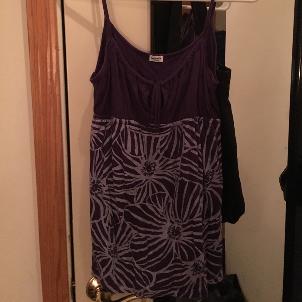 Purple tank top with floral design.