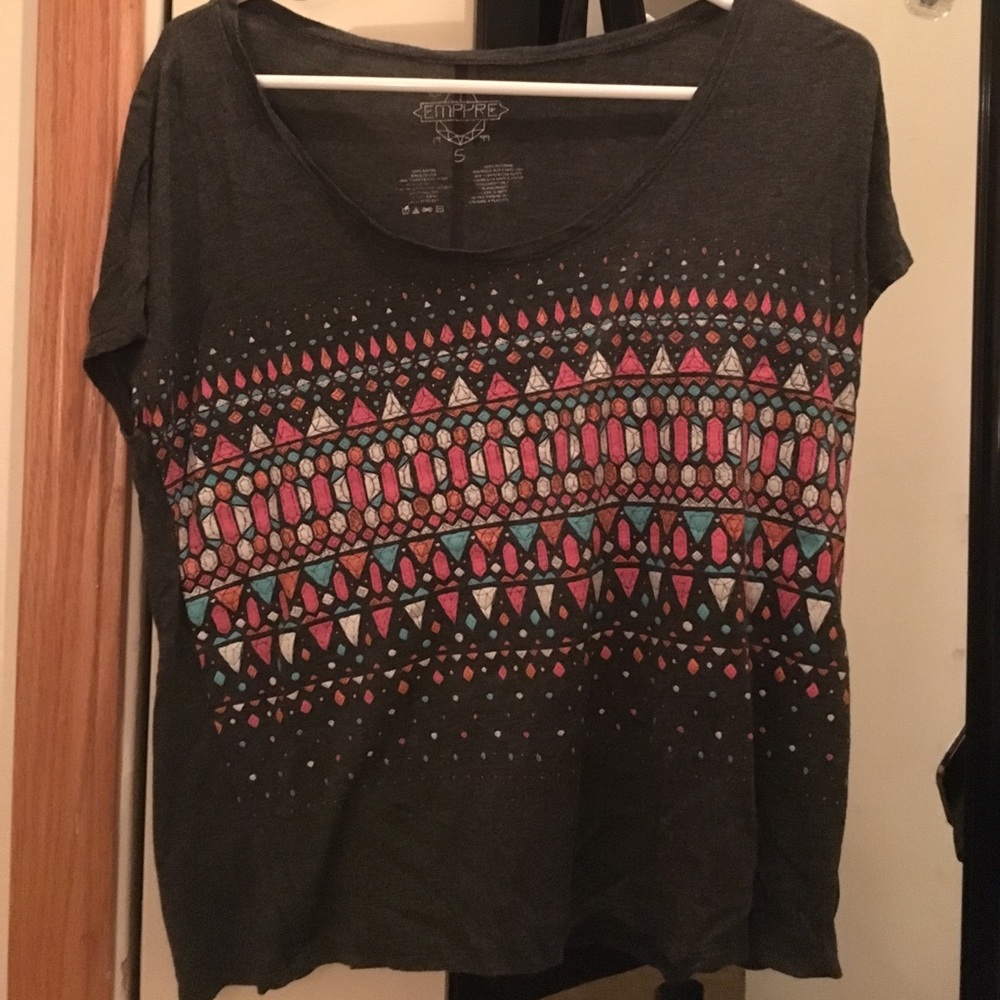 Gray short sleeved shirt. Vivid jewel design.
