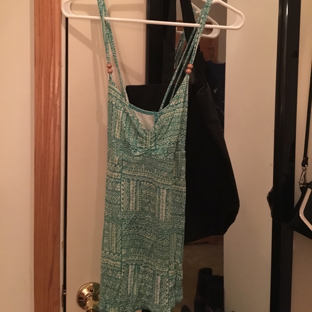 Green tank top.