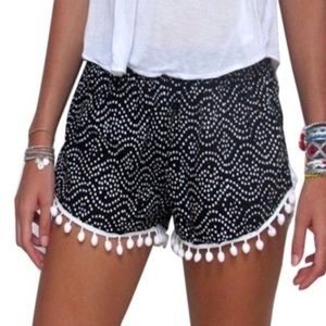 trendy leaf print tassel shorts