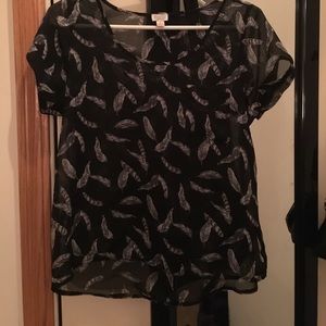 Sheer feather shirt.