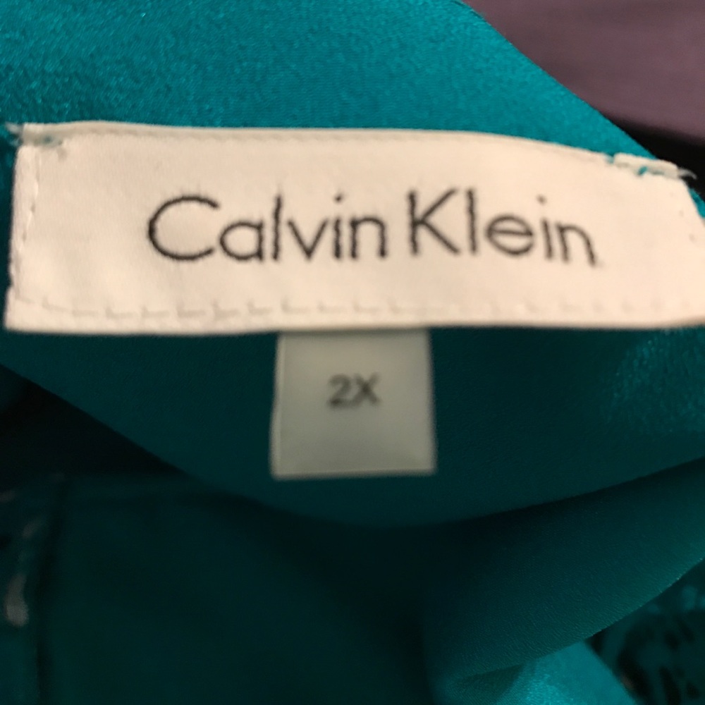 Calvin Klein turquoise tealtop with lace insert and roll up sleeves. - Picture 7 of 8