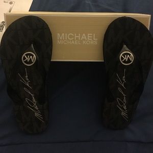 Michael Korda Flip Flops