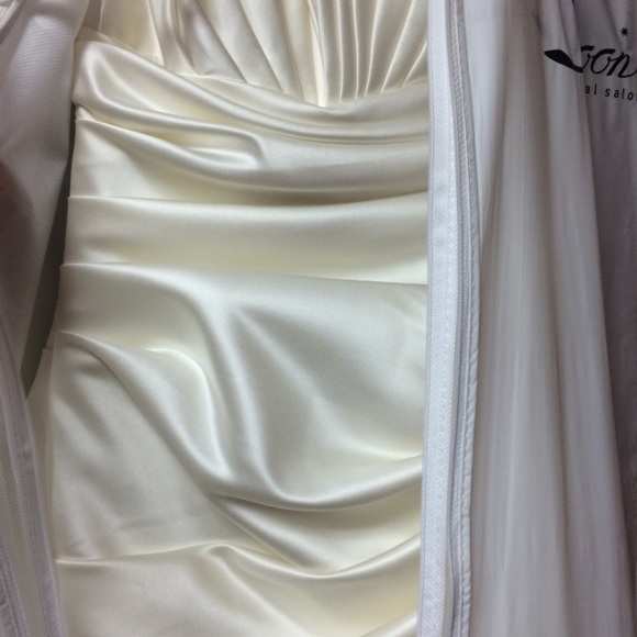 Beautiful NWT unaltered wedding gown