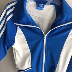 Brand new Blue and white adidas jacket .