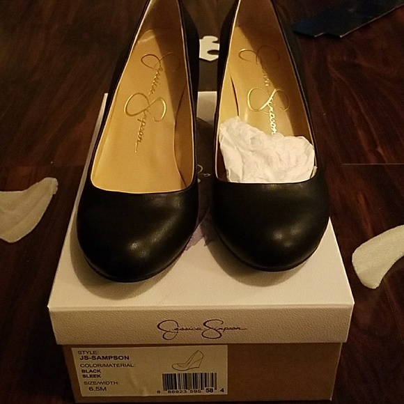 Jessica Simpson Shoes - Jessica Simpson black wedge heels