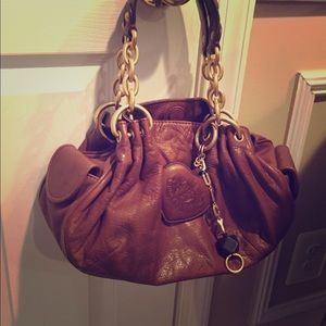 Juicy couture fluffy in brown leather with charms