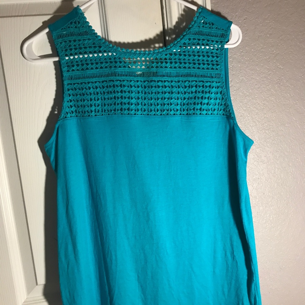 Blue tank top.