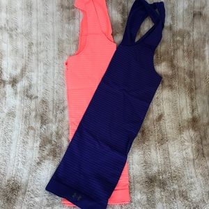 Orange and Blue UA tanks