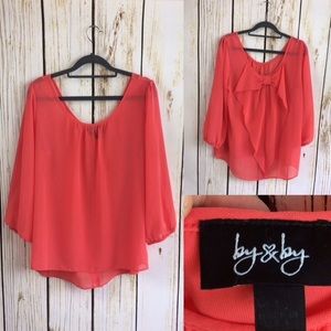 Blouse with bow on back