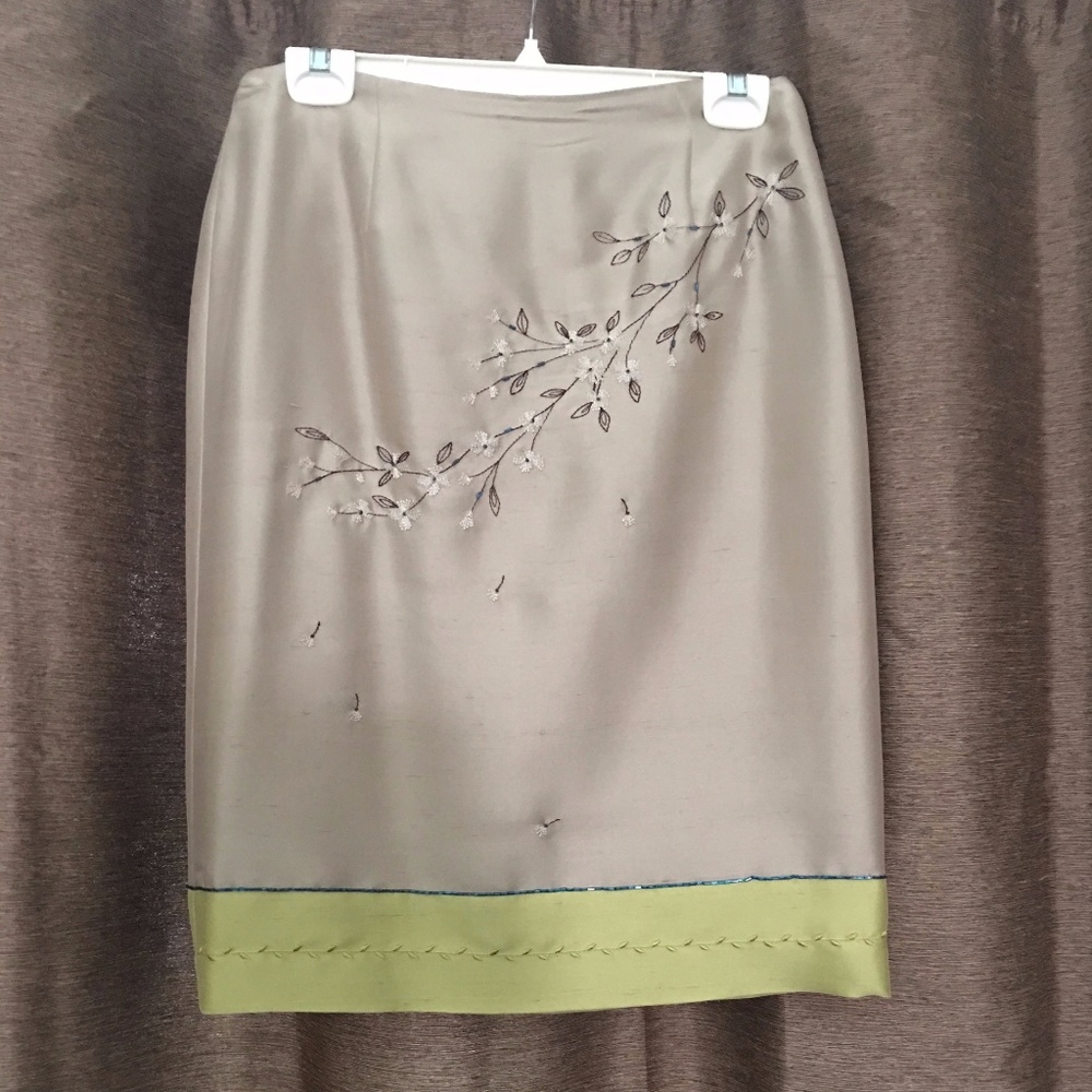 Stylish shimmery gold skirt with flower design