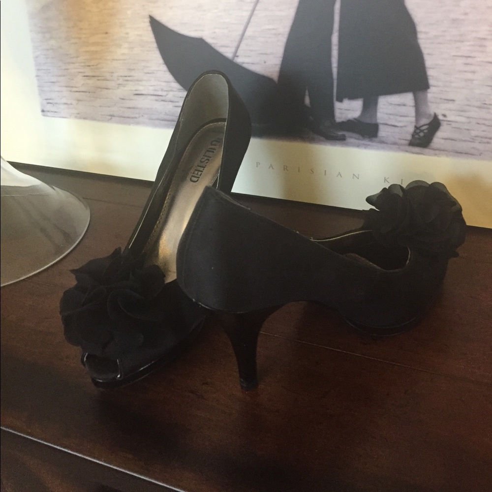 Black peep toe heels with floral appliqué