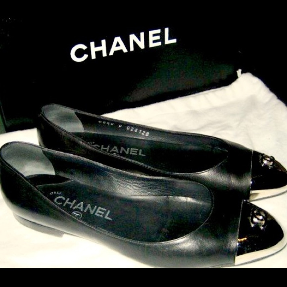 Slightly used Chanel flats with silver Chanel logo