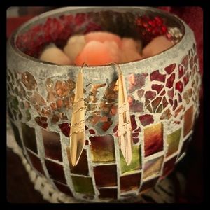 Faceted gold earrings.