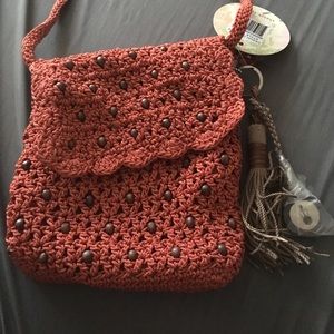Red/orange hand-crocheted purse from the sak