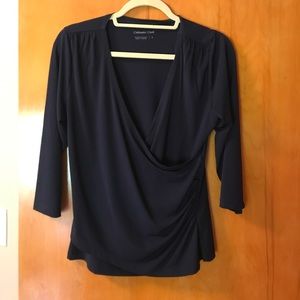 Navy blue three-quarter sleeve top.
