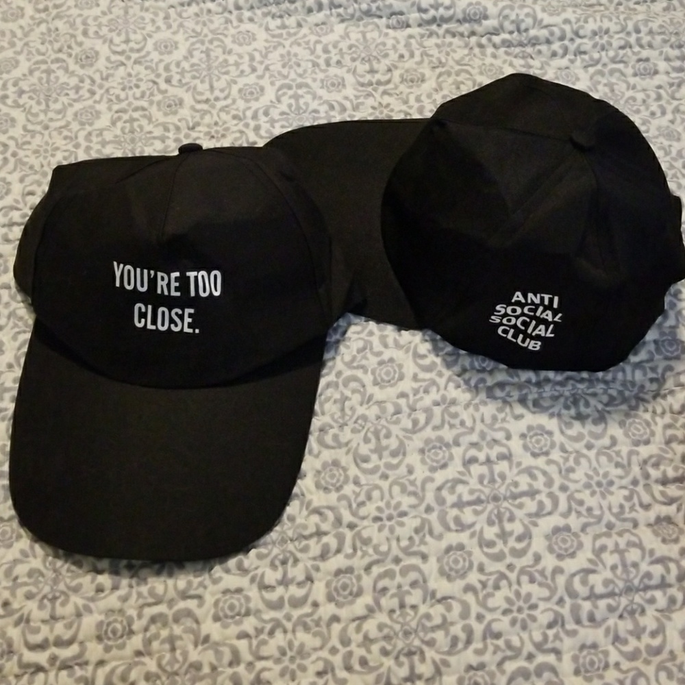 Pair of black snap back hats - never worn