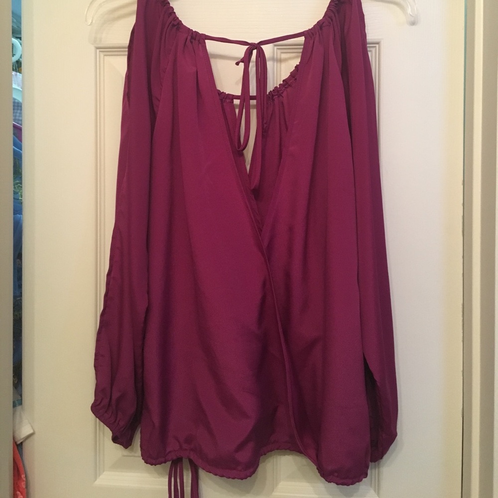 Long sleeved open back, cross front shirt