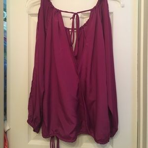 Long sleeved open back, cross front shirt