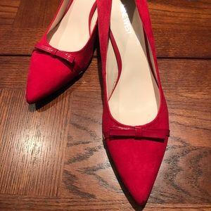 Red pointed toe heels