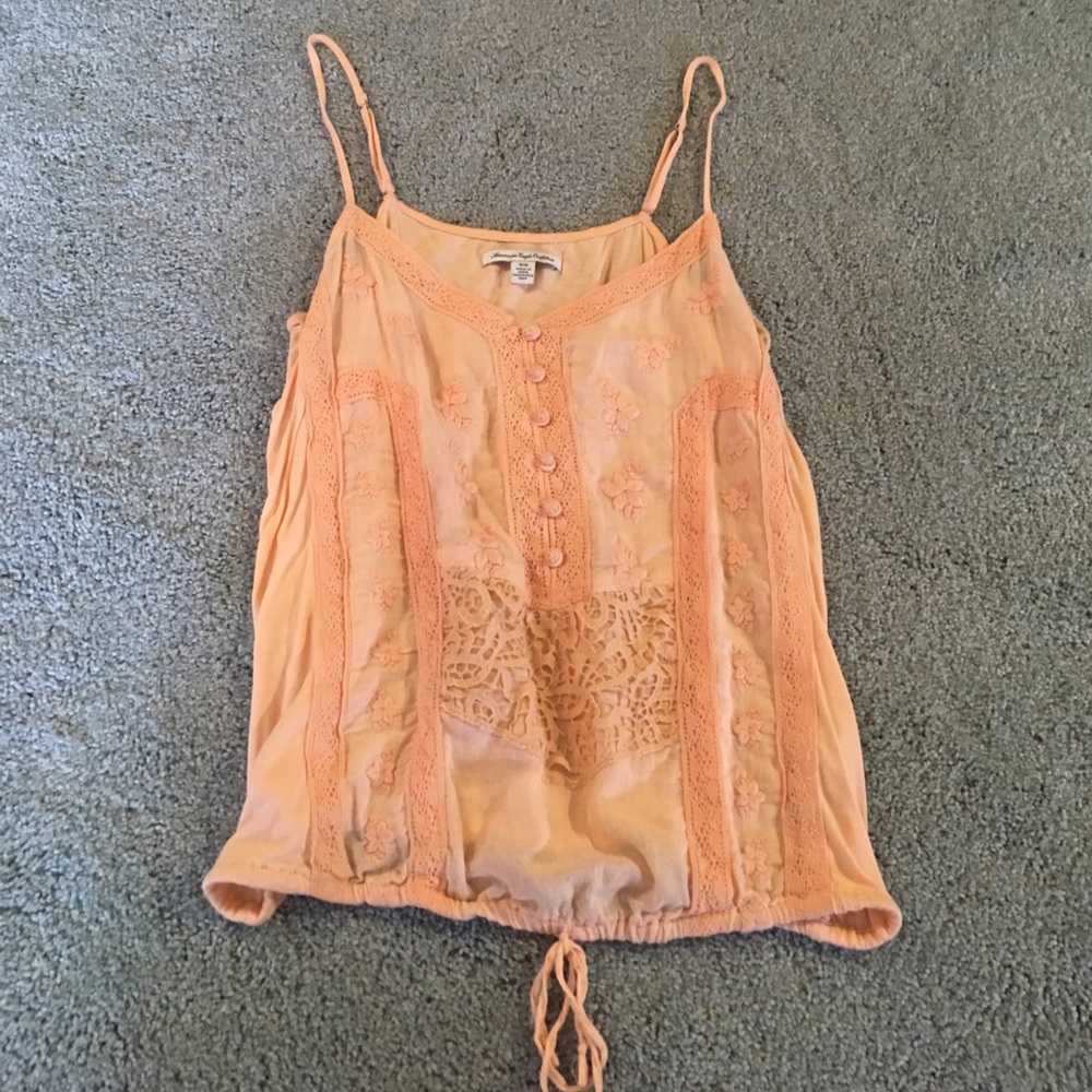 Tank top with tie-bottom