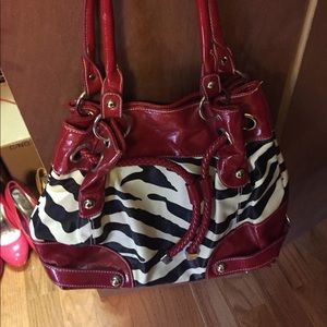 Red and zebra print purse