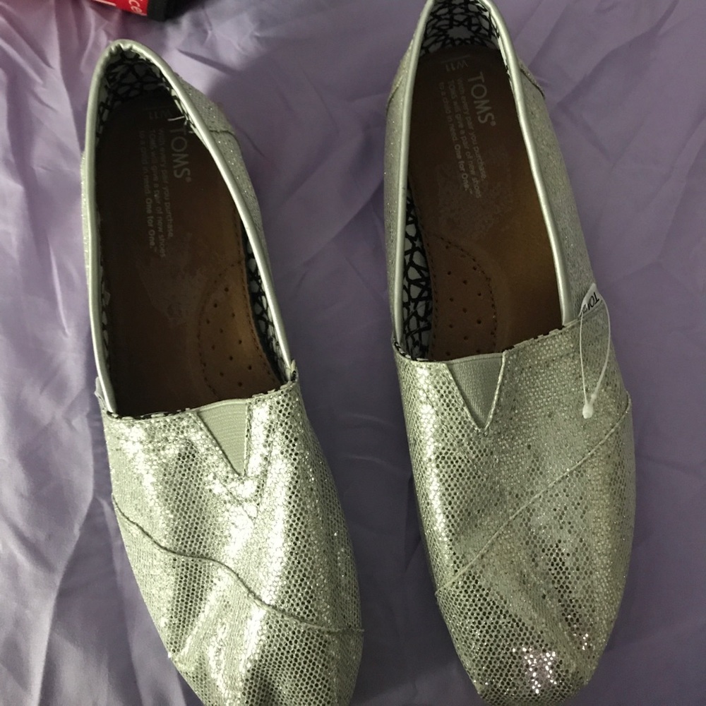 Size 11 Glitter Toms. Worn once.