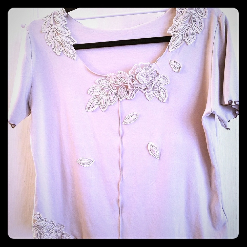 Elegant top with floral  details