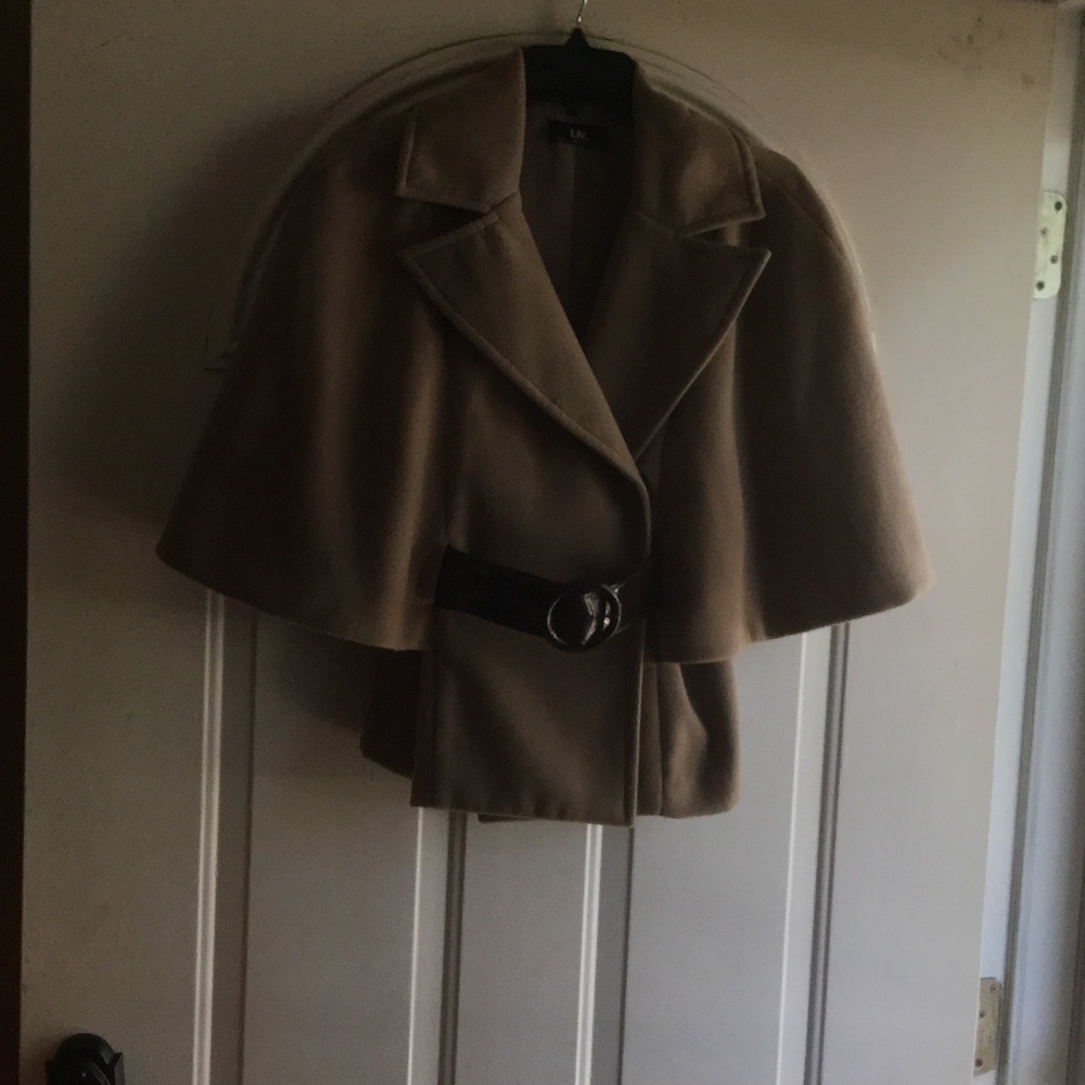 Short tan jacket with brown belt.