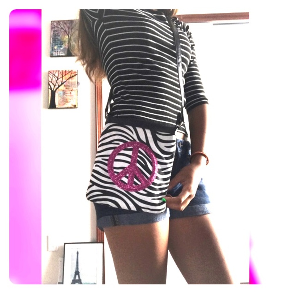 Zebra purse with pink peace sign