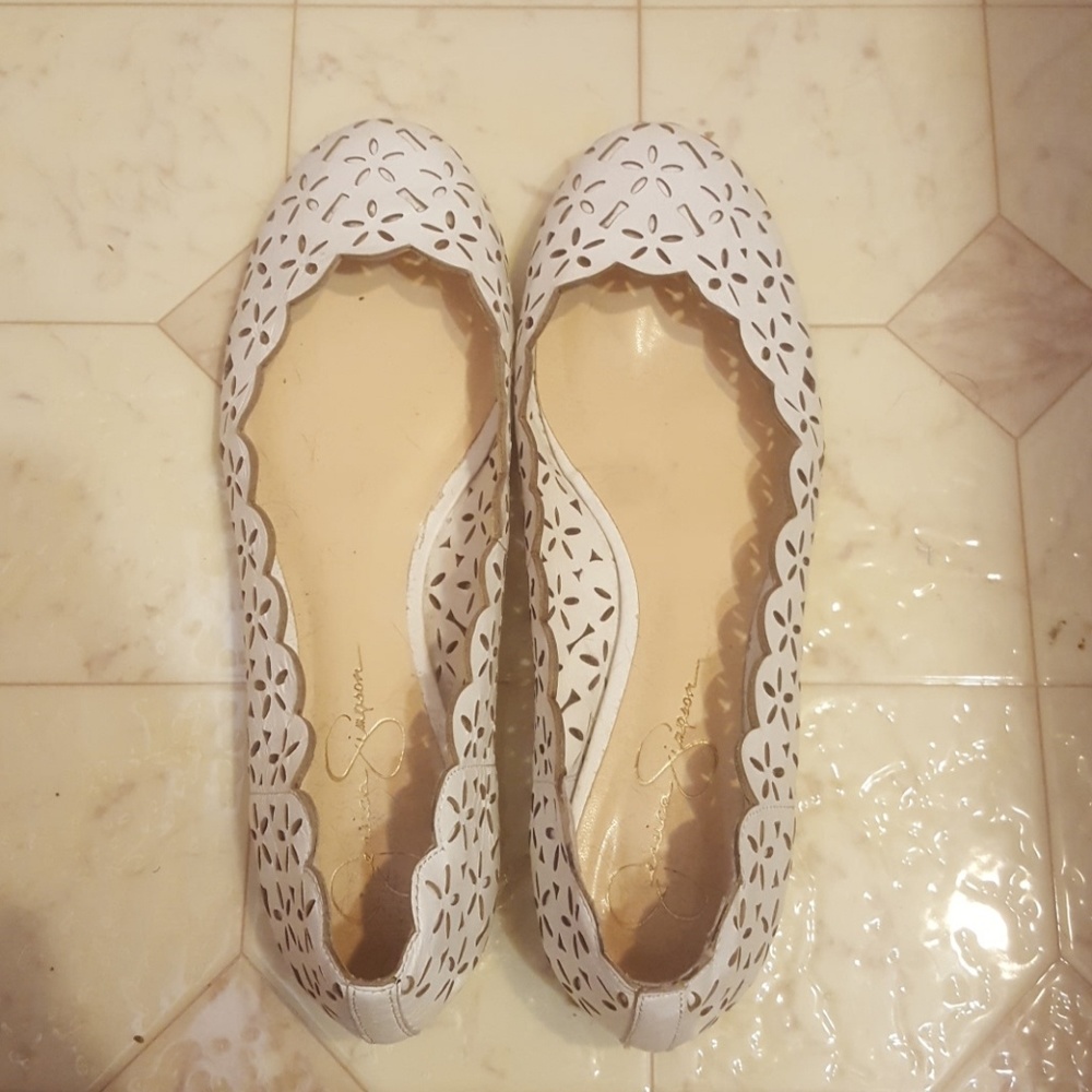 White Jessica Simpson ballet flats with cutouts