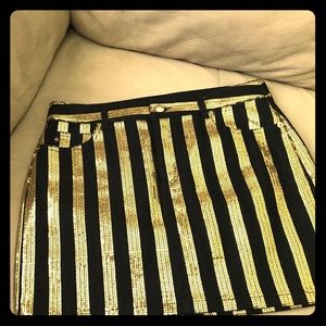 Gently worn MK black gold studded Jean skirt