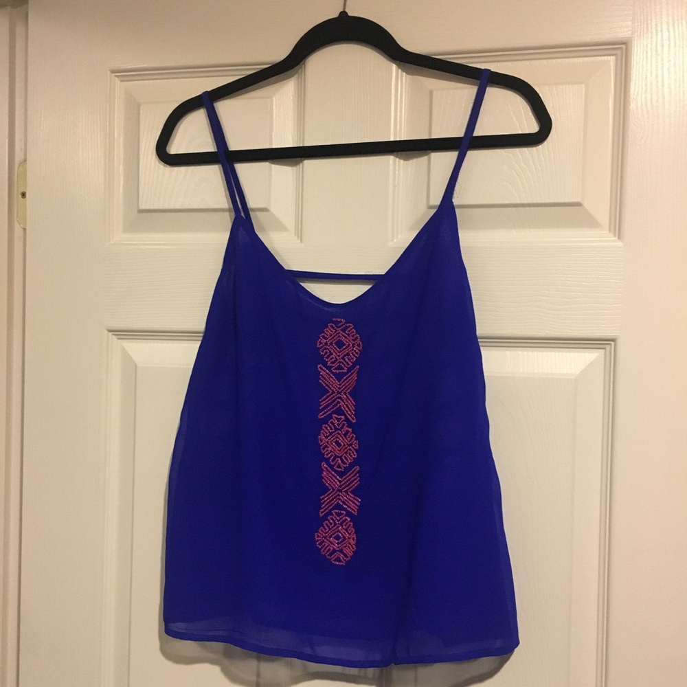 Beaded sheer blue top with caged back