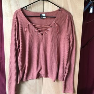 a lace up long sleeve shirt