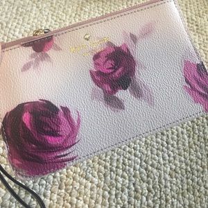 Kate Spade wristlet, never been used.