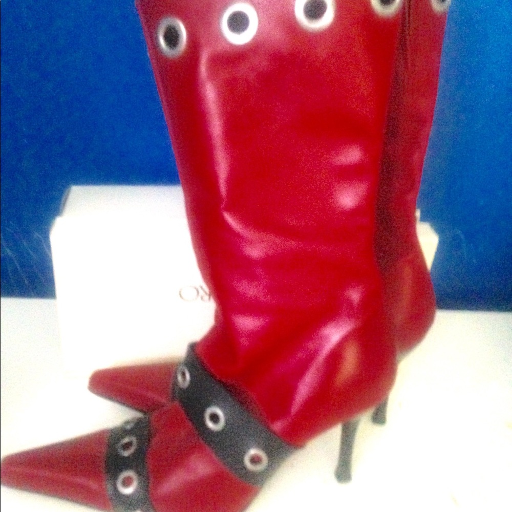 Red leather boots like new metal and black trim