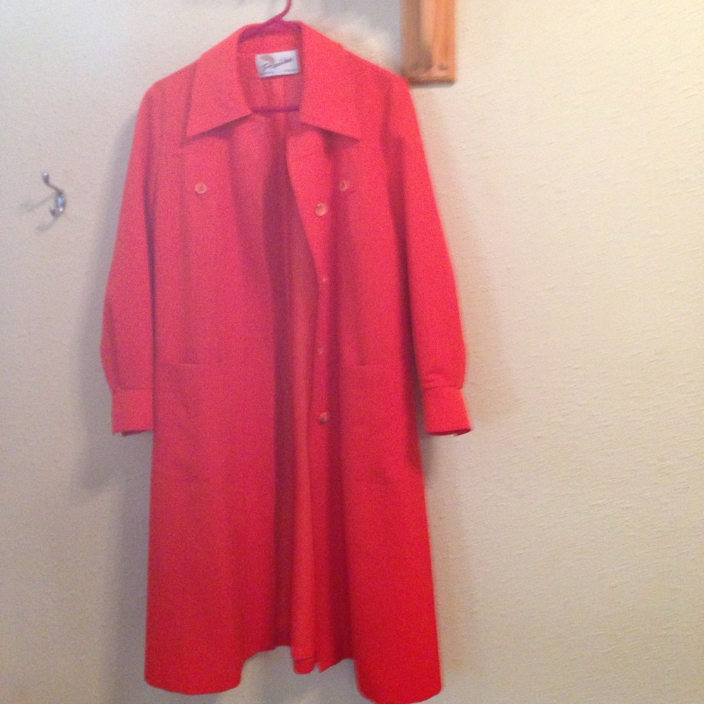 Red belted raincoat