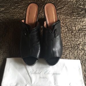 Robert Clergerie black slide with platform heel.