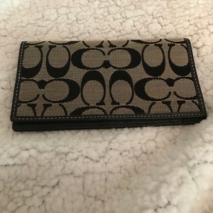 Authentic Coach checkbook register cover.