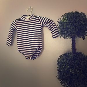Black and white striped onesie