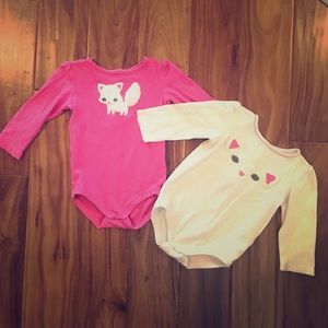 Pair of kitten onesies