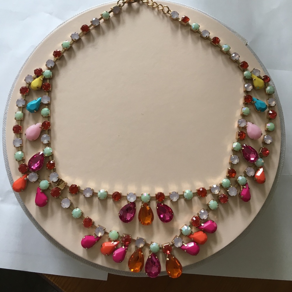 A multi-colored gem collar necklace
