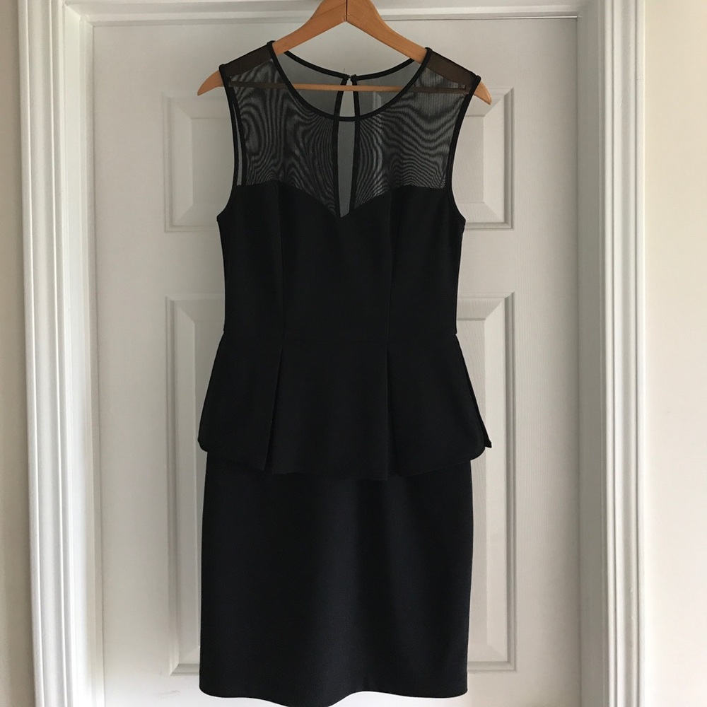 Black peplum cocktail dress