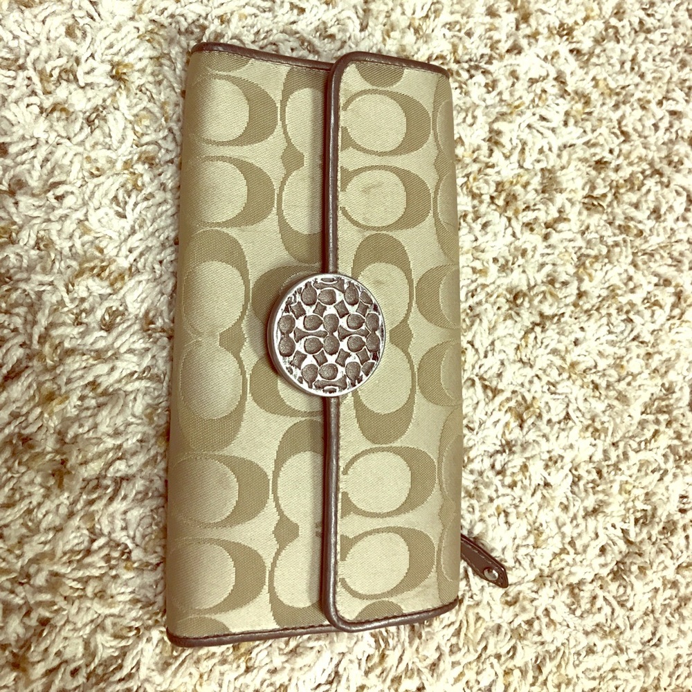 Gold and brown Coach wallet