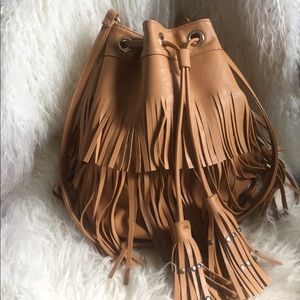 Tan tassel fringe bucket bag