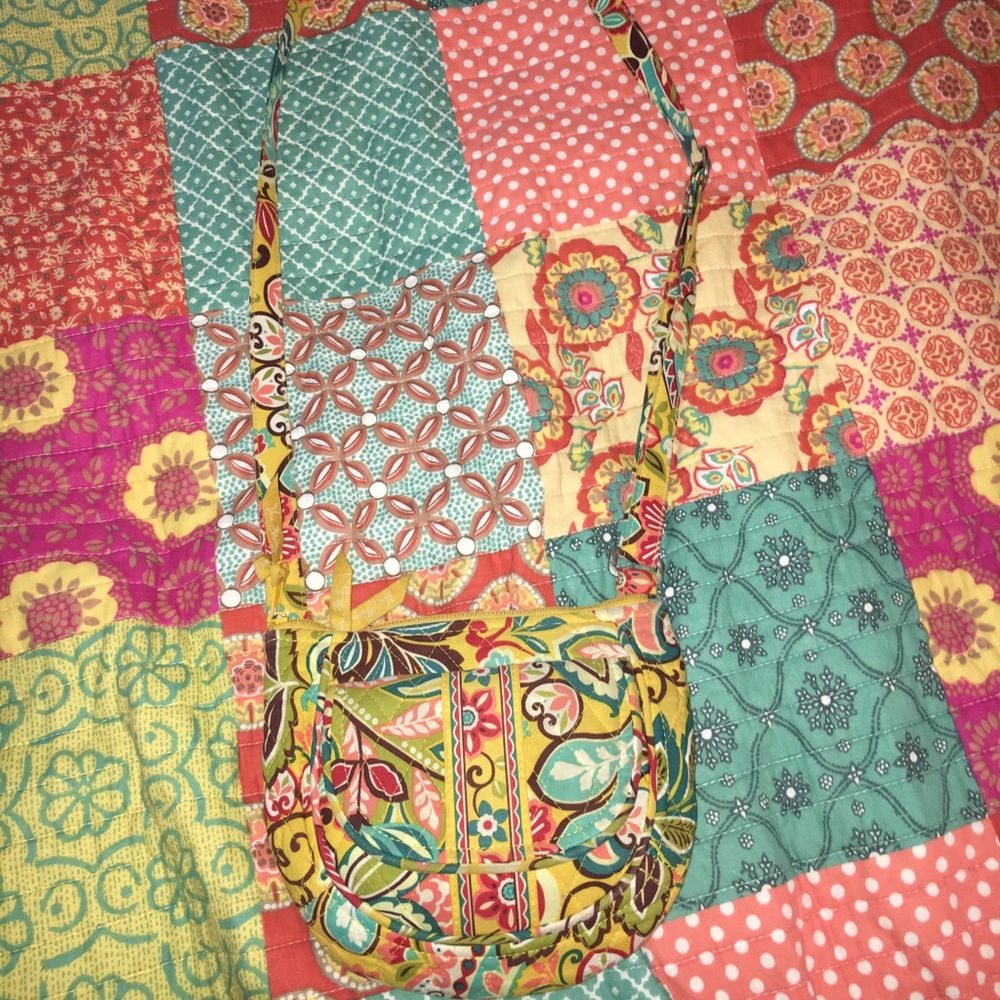Yellow and floral detailing purse.