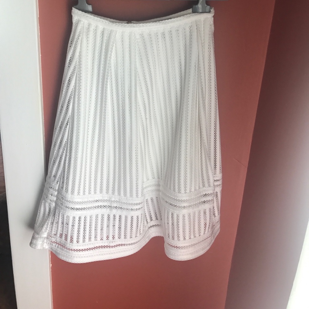 White knee length skirt