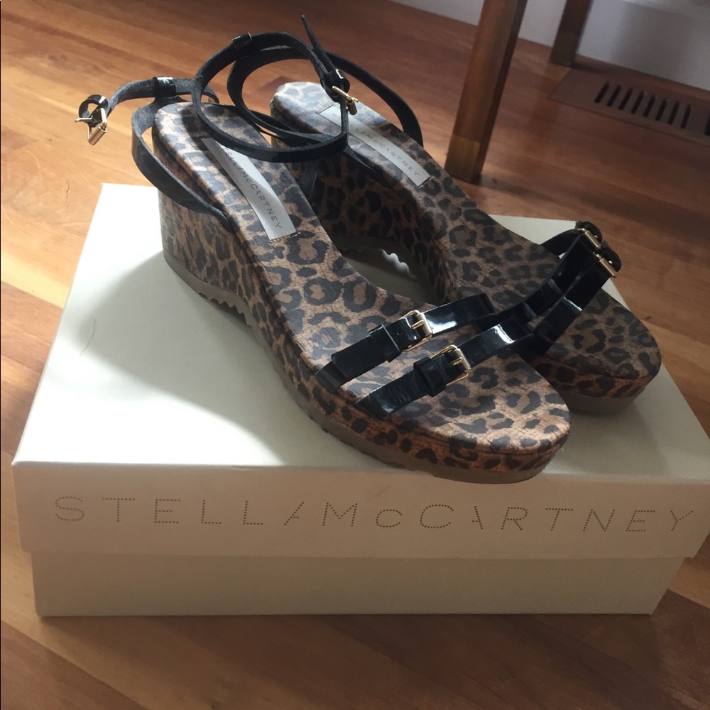 Cheetah wedges with leather buckles